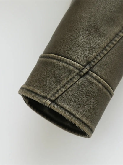 Agripina | Chaqueta de piel sintética con cinturón y cremallera para uso urbano.